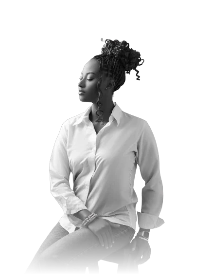 Patricia, the makeup artist behind Glams by Tricia, in a black and white portrait